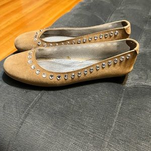 Rhinestone studded suede flats.